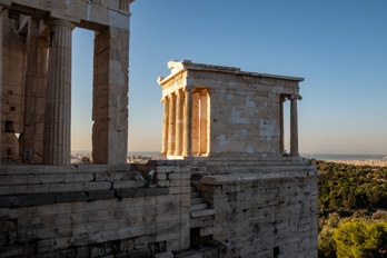 The morning sun shines on the Temple of Athena Nike