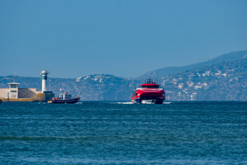 The harbour entrance of Priaeus in Greece with the high-speed ferry AERO 2 coming from Aegina, taken with a long lens. Passenger Ship, IMO 9952799