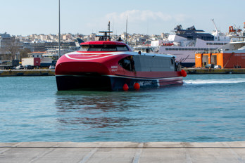 High-speed ferry AERO 2 to Aegina docking in the harbor of Piraeus, Greece. Passenger Ship, IMO 9952799