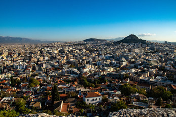 View to the north from the Acropolis over the old town of Athens. Lycabettus Hill in the background.