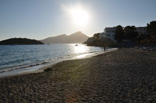 Small sandy beach on a summer evening