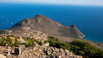 View from Mount Hellanion Oros to Cape Andonis Aegina, the south-eastern tip of the island of Aegina in the Saronic Gulf. From here you can see the village of Vlachides and the church of St. Anthony.