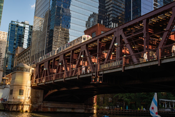 A commuter train crosses the Chicagor River on the upper level of the Lake Street bridge.
Architectural boat tour Chicago river and lake
