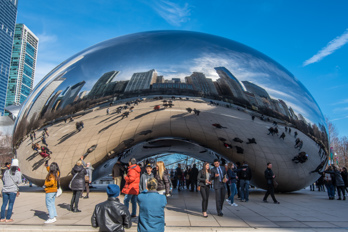 Cloud Gate (the bean) is the central artwork of the AT&T plaza in Chicago's Millennium Park