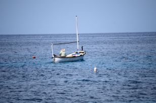 Small fishing boat on the way to the fishing grounds