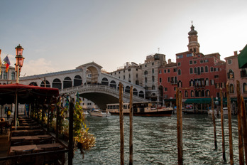 Restaurants, gondolas and a lot of tourists crowd around the Rialto Bridge in the heart of Venice.