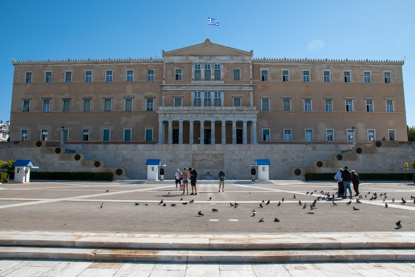 The former royal palace with the Greek parliament. In front of it, Syntagma Square with the Tomb of the Unknown Soldier in Athens.