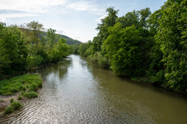 View of the banks of the Kocher at the bridge in Indelfingen