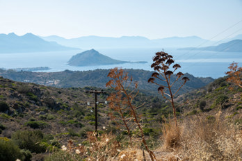 View from the country road near Pachia Rachi on the island of Aegina in the direction of Perdika and the island of Moni.