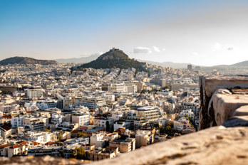 Mount Lycabettus with the Chapel of St. George rises above the sea of houses in Athens. It is the highest elevation in Athens.