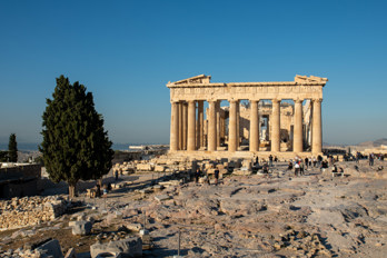 The Parthenon illuminated by the morning sun, on the rock of the Acropolis.