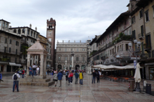 The square is the center of Verona. In the foreground the Tribuna (Pillory). In the background the tower Torre del Gardello, the Palazzo Maffei, the column Colonna di San Marco and the statue Fontana Madonna Verona.
