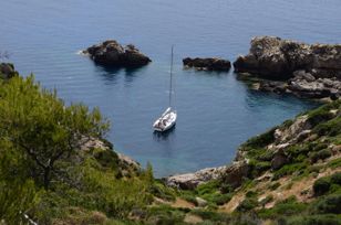 Small natural bay with sailboat 