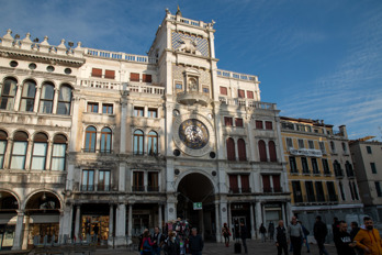 If you enter St. Mark's Square (Piazza San Marco) from the direction of the Rialto Bridge, you will pass through the St Mark's Clocktower (Torre dell'Orologio).