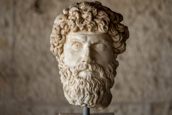 Head of a statue with a long beard from the Museum of the Ancient Agora in the Stoa of Attalos in Athens, Greece.