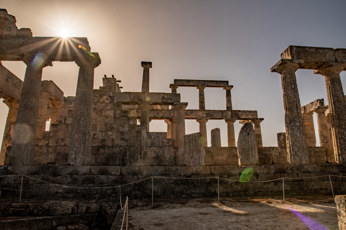 View from the north towards the sun into the temple of Aphaia. The Doric columns stand on a three-tiered crepis, the above-ground substructure of a Greek temple.