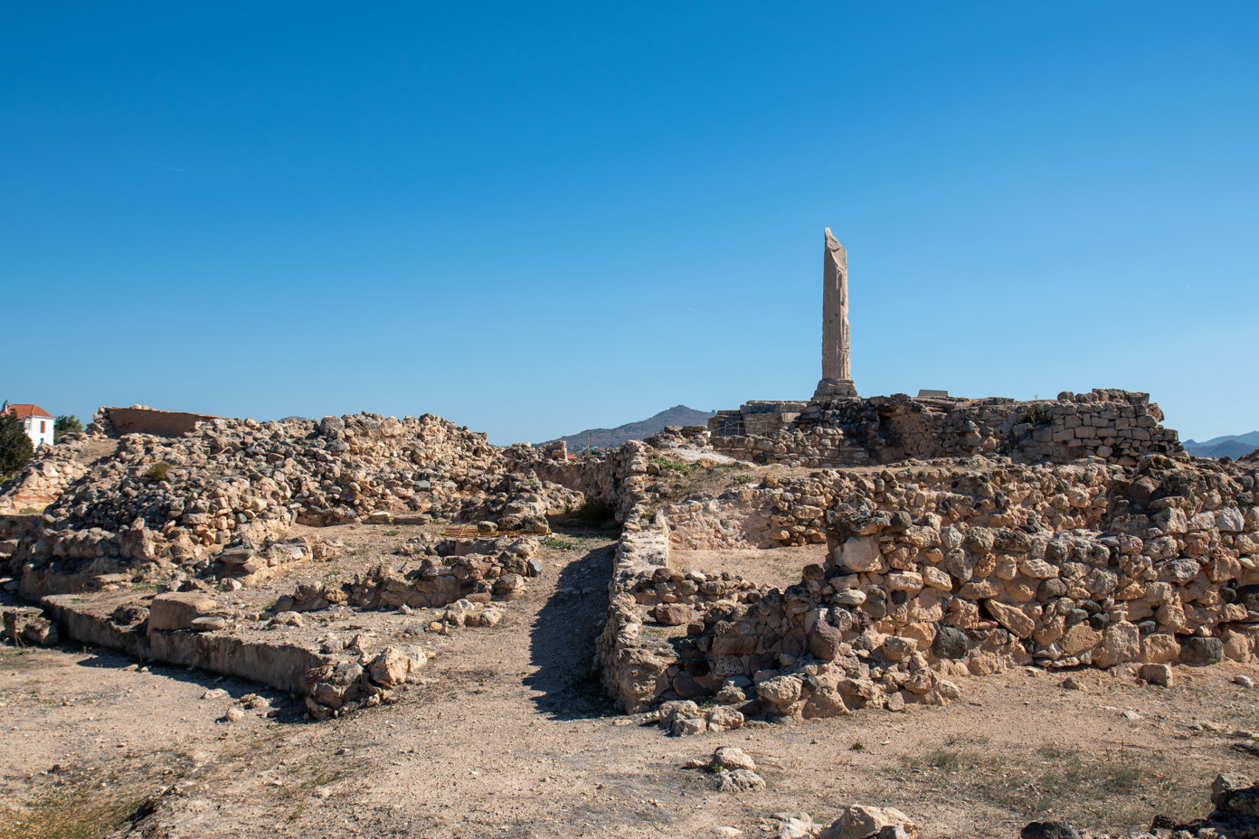 Ruins of the Temple of Apollo. Foundation walls of rooms and cisterns.