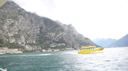 Yellow boat on lake Garda